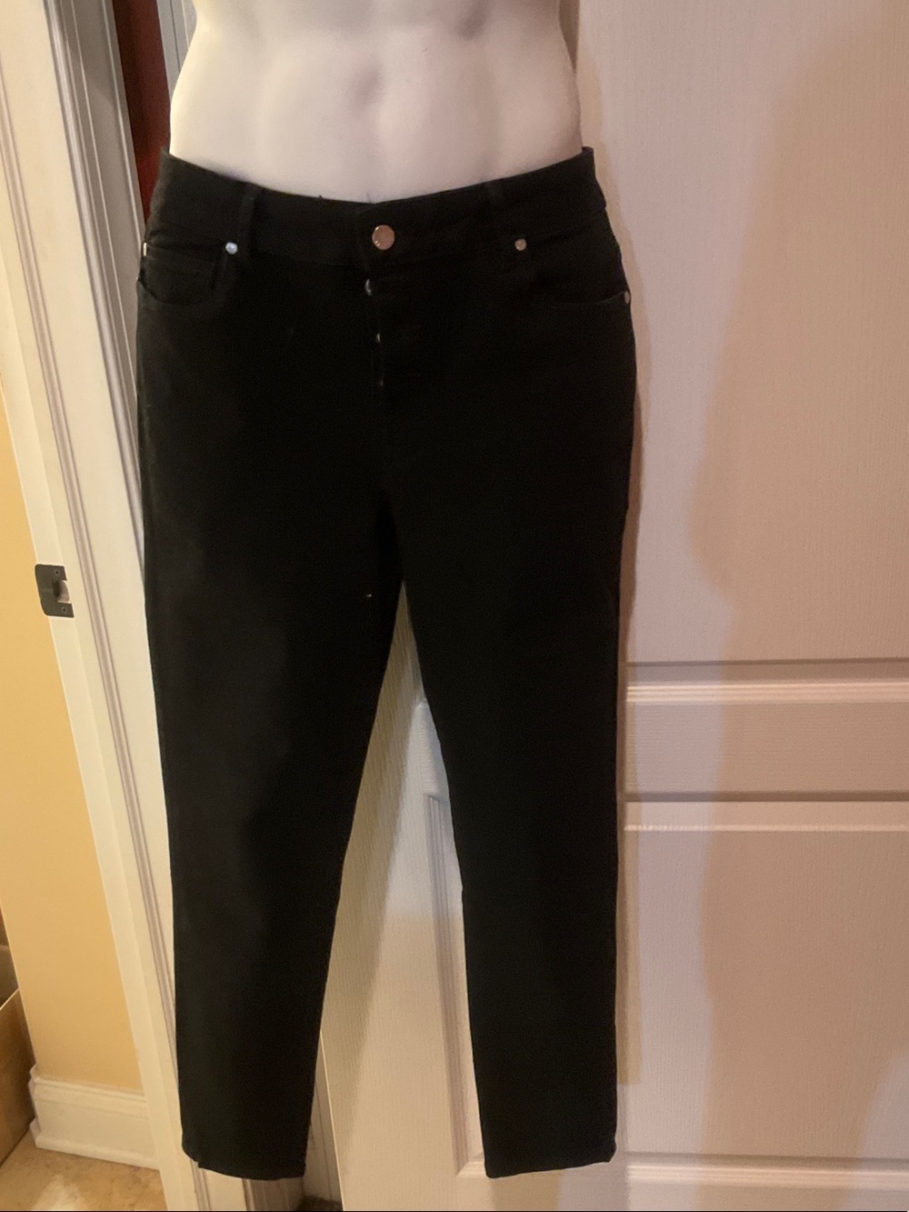 Tahari button from black jeans